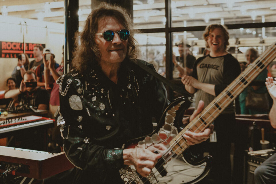 Inductee Dennis Dunaway of Alice Cooper Band performs in The Garage with Blue Coupe on Alice Cooper Fan Day.