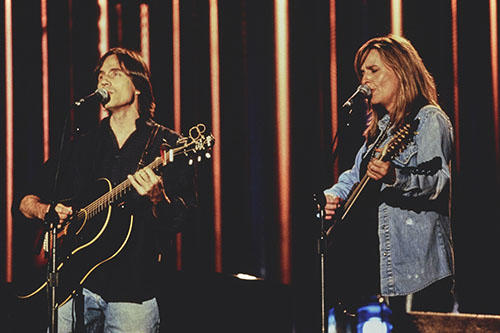 JACKSON BROWNE AND MELISSA ETHERIDGE PLAYING AT THE ROCK HALL OPENING CONCERT